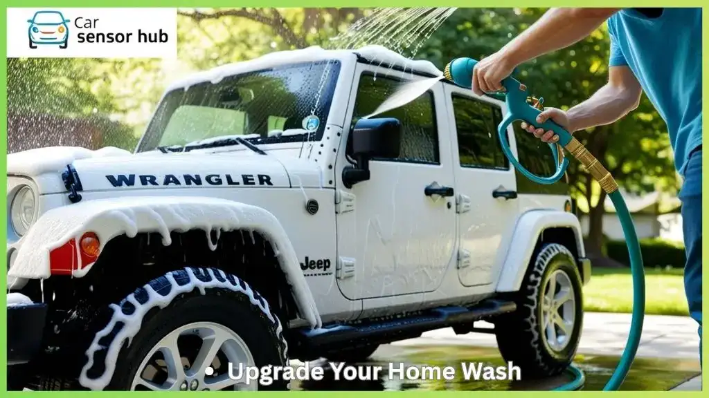 Person washing Jeep Wrangler using foam gun attached to garden hose