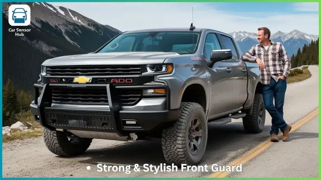 Chevrolet Silverado 1500 with a heavy-duty black grille guard on a mountain road