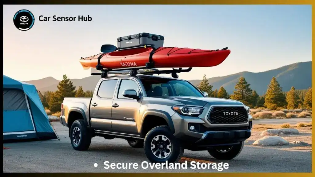 Toyota Tacoma with roof rack carrying kayak and cargo box at campsite