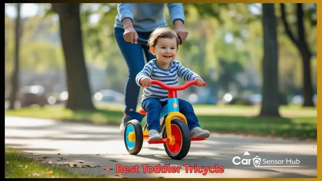 Toddler riding a tricycle outdoors with parental supervision