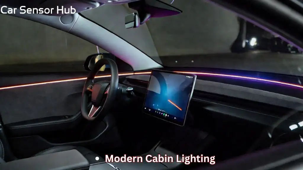 Tesla Model 3 Highland ambient lighting glowing across dashboard and doors inside a modern night-time cabin