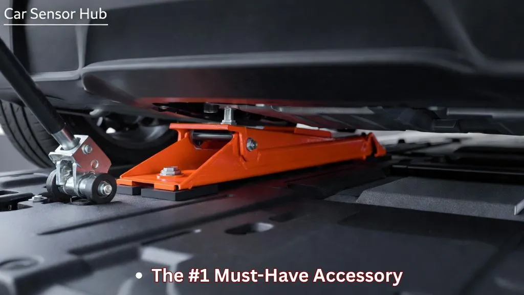 A rubber jack pad puck inserted into the designated lifting point of a Tesla Model Y.