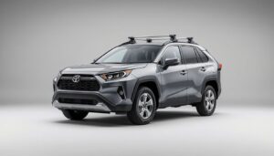 A 2026 Toyota RAV4 with aerodynamic black cross bars and a cargo box.