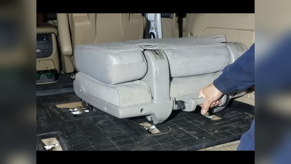 chevrolet suburban third row seat not folding