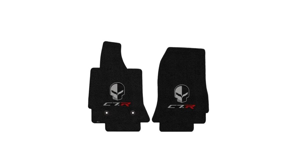 Custom-fit C7 Corvette floor mats installed inside a clean and modern sports car cockpit.