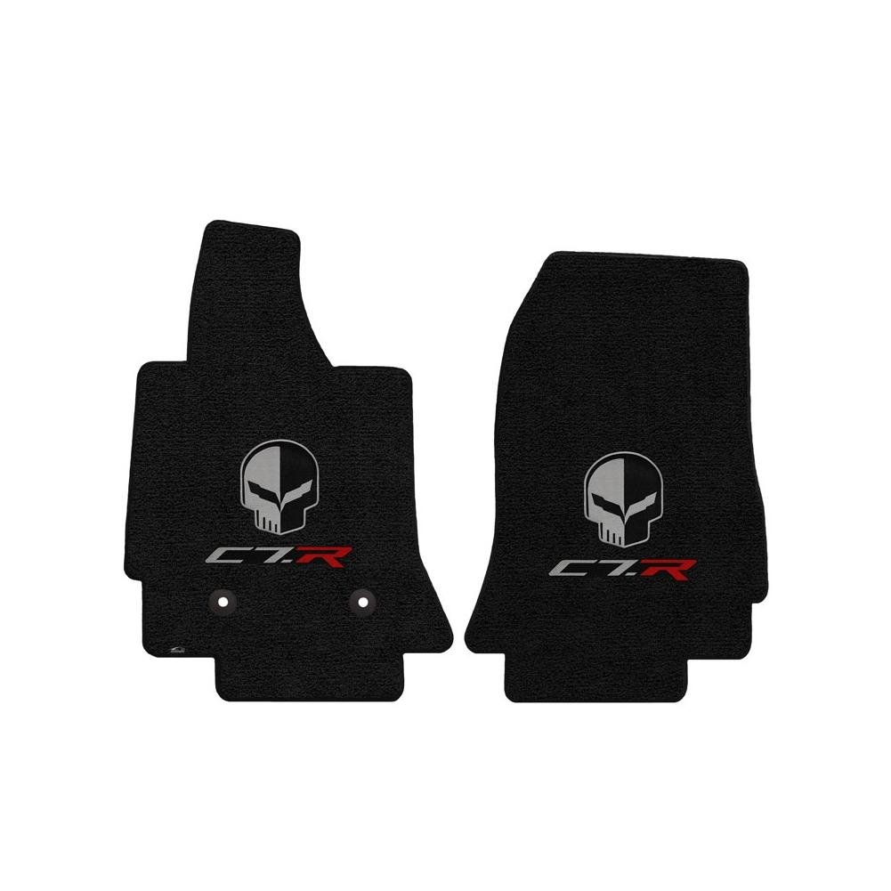 Custom-fit C7 Corvette floor mats installed inside a clean and modern sports car cockpit.