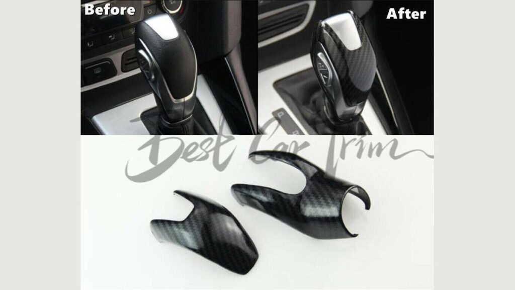A luxury gear shift knob cover trim installed inside a Ford Fusion interior.