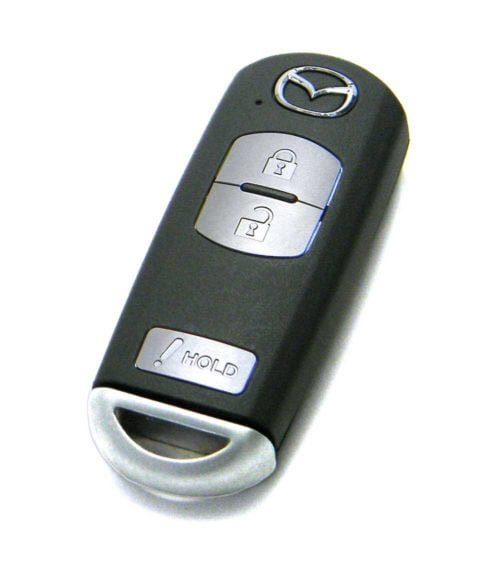 A Mazda CX-5 parked in an open, safe outdoor area for remote engine operation.