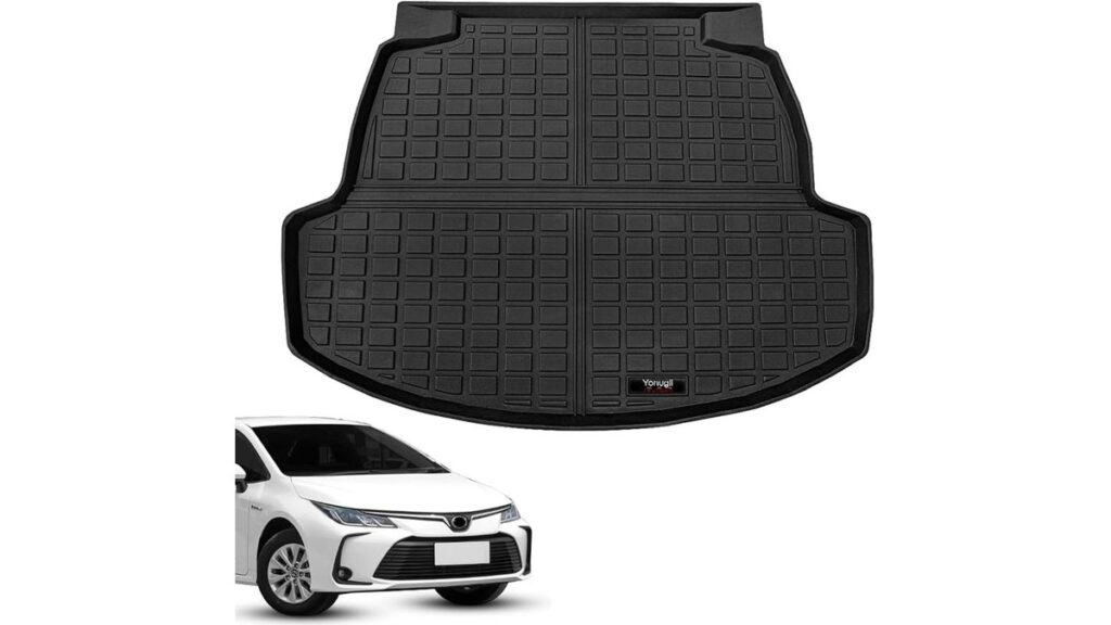 Custom black trunk liner fitted inside an open Toyota Corolla trunk