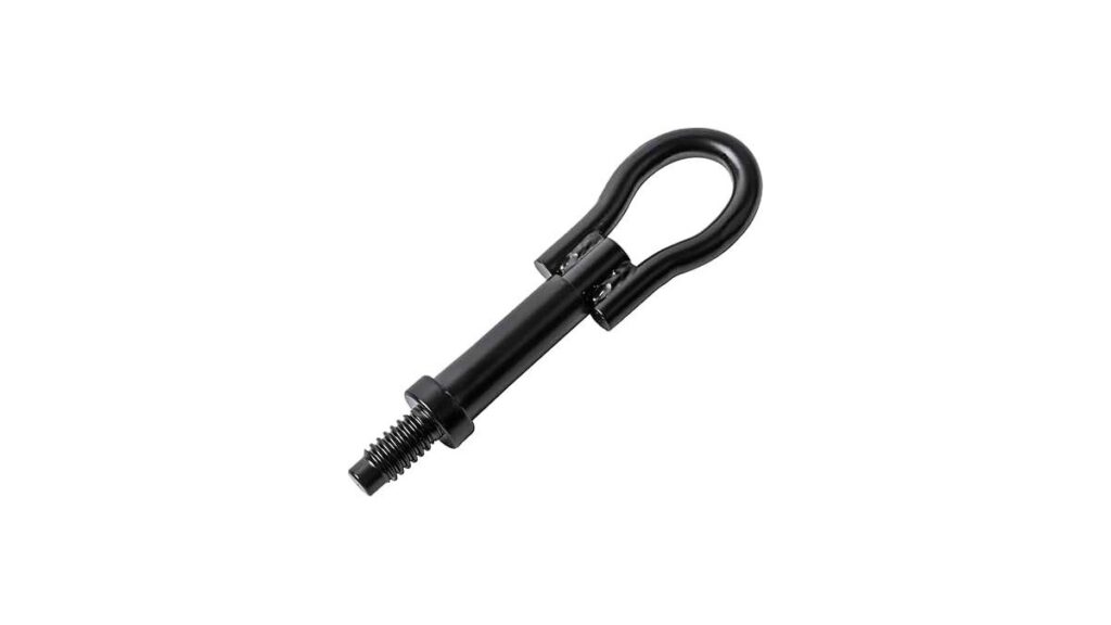 A heavy-duty tow strap with steel hooks placed beside a modern Ford Fusion vehicle.
