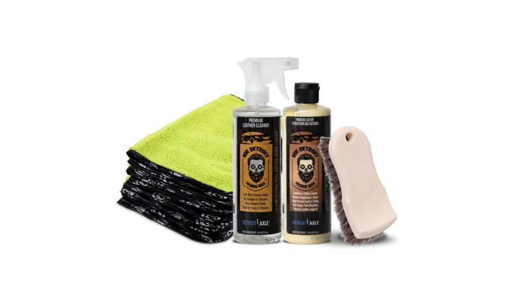 Leather car seat in a Toyota Corolla with conditioner bottle and cloth