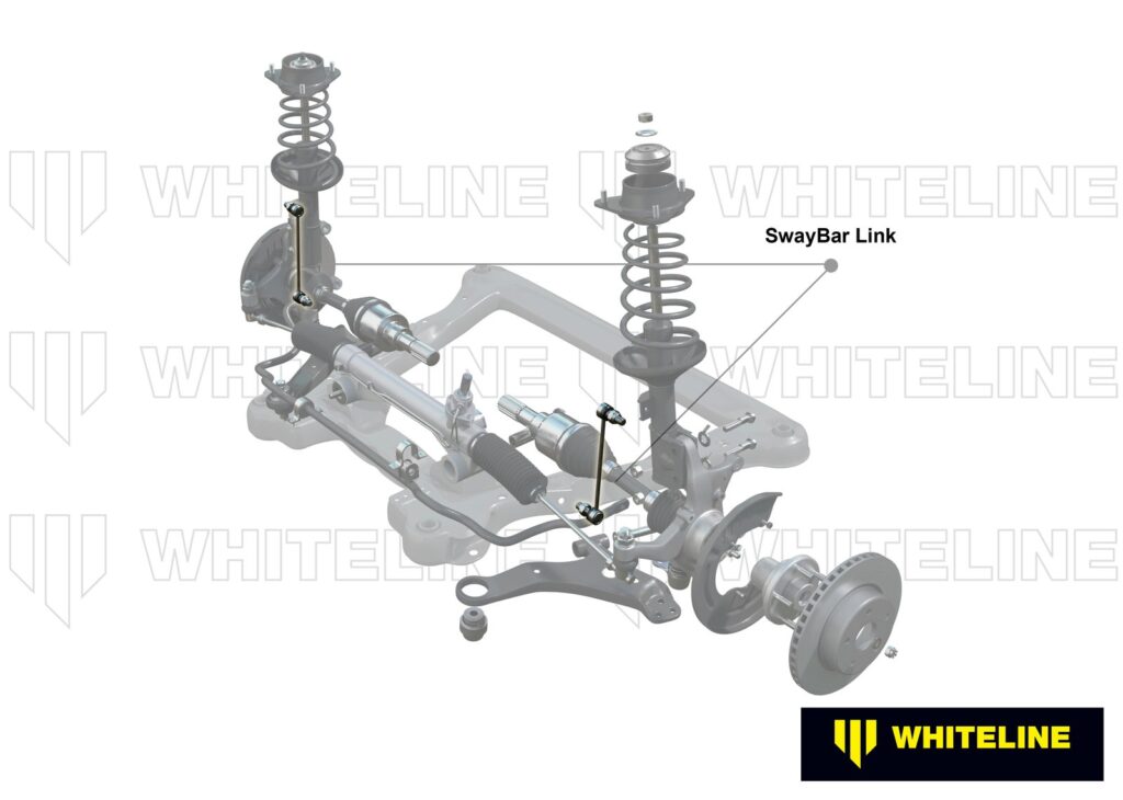 A new front sway bar link for a Toyota Corolla on a workbench.