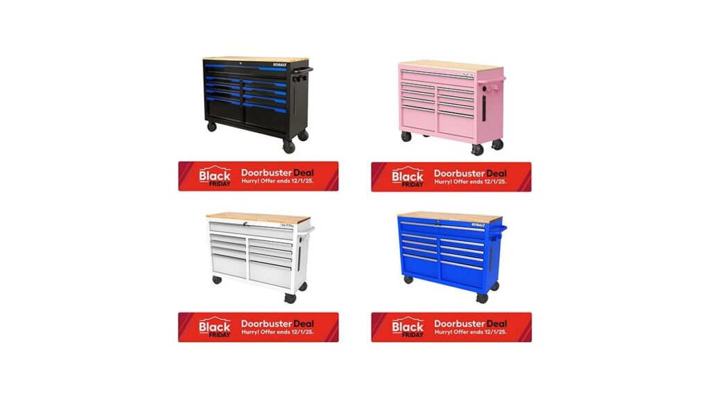 Open red mechanic's tool chest in a bright home garage with tools on the workbench