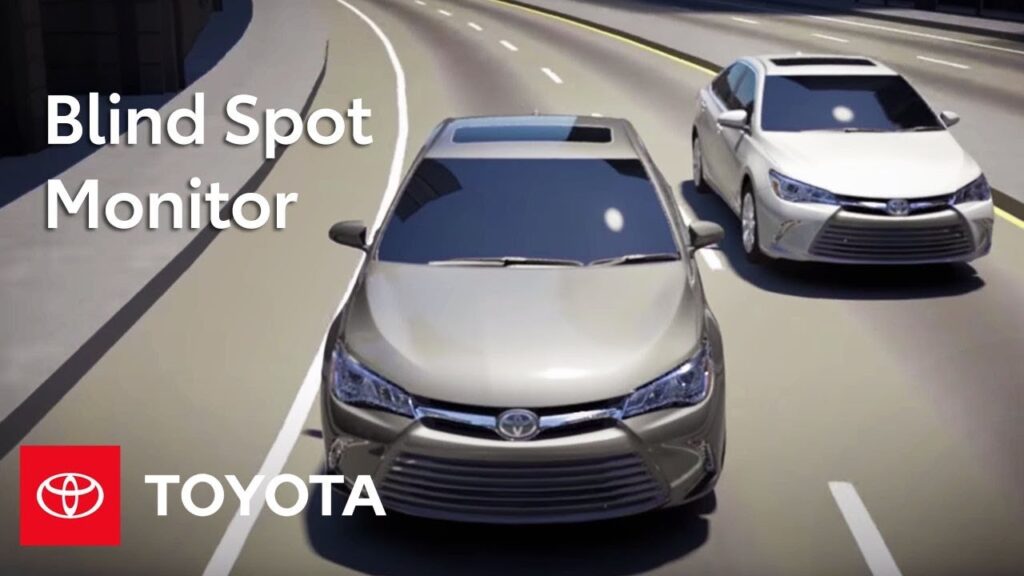Silver Toyota Corolla parked on a quiet street highlighting safety features.