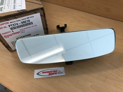 Smart rear view mirror installed in a Toyota Corolla showing a clear digital display.