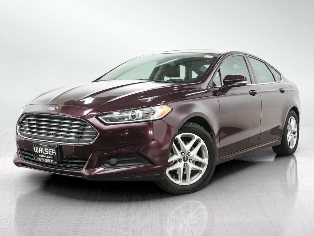 Steering wheel lock secured on Ford Fusion wheel for anti theft protection