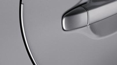 Toyota Corolla door with a metallic door edge guard installed
